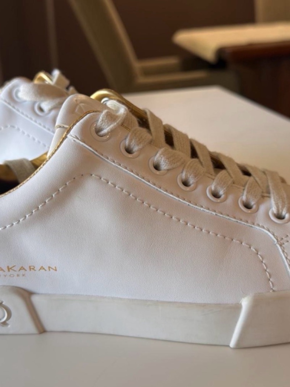 DKNY White Sneakers with Gold Trim